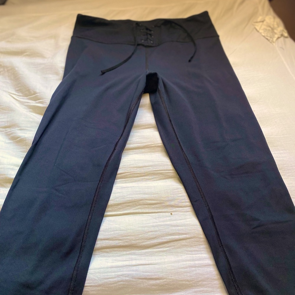 Victoria’s Secret fun leggings with tie waist. Has stretch.